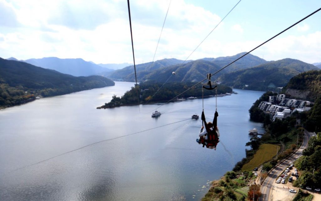 View of our youngest son on the Nami Island Zipline - you can see Nami Island in the middle of the river